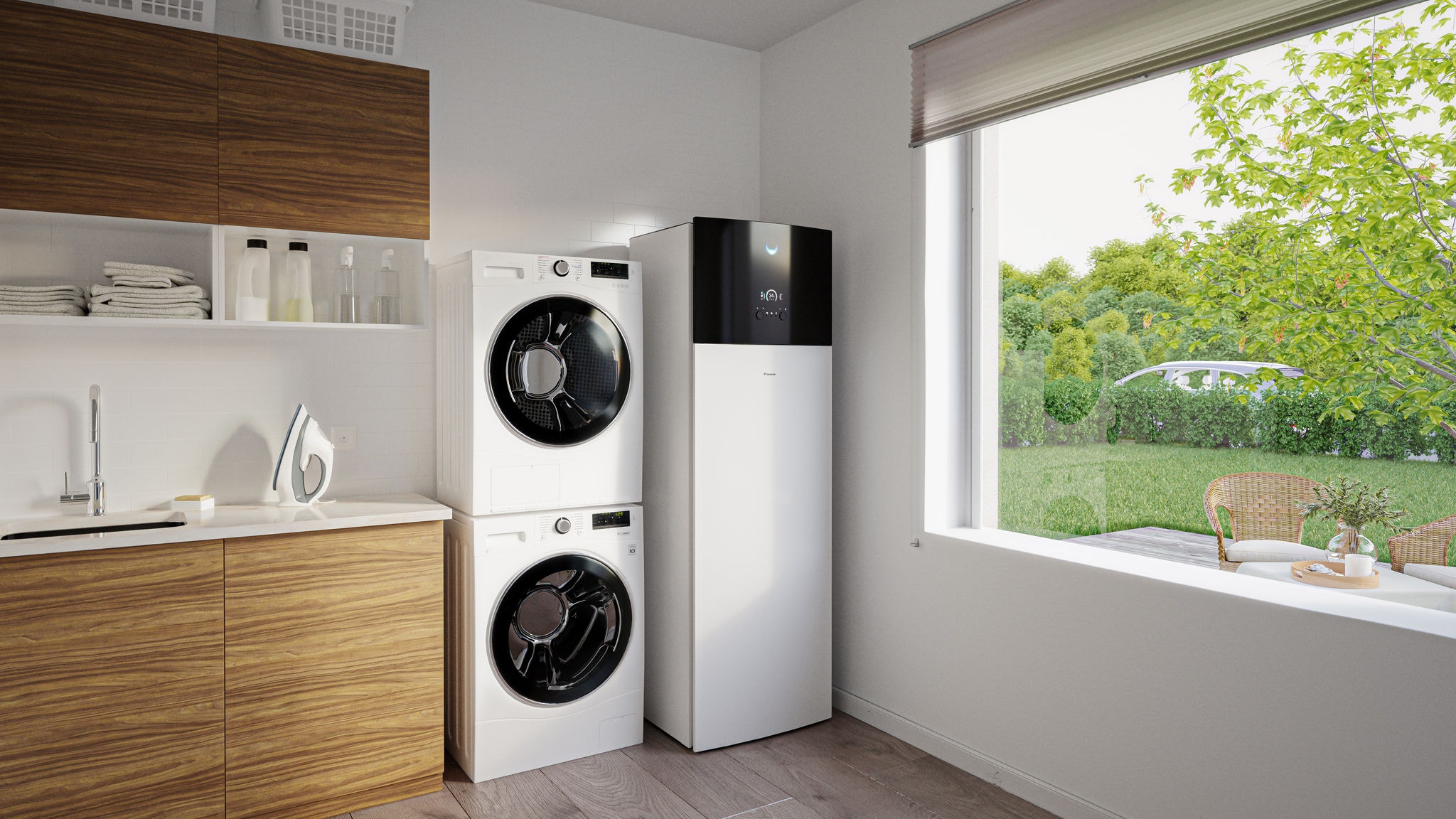 Lucht-waterwarmtepomp binnenunit met een geïntegreerde sanitaire warmwaterboiler naast de wasmachine en -droger